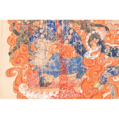 395 - A silk thangka depicting Mahakala, Tibet, 19th C.Description:Dim.: 79 x 78 cm (the frame)Dim.: 64,5 ... 