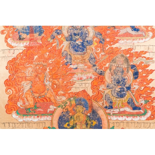 395 - A silk thangka depicting Mahakala, Tibet, 19th C.Description:Dim.: 79 x 78 cm (the frame)Dim.: 64,5 ... 