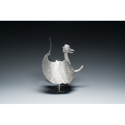 400 - A rare Indonesian silver 'Garuda' oil lamp for the Wayang theatre, 'blencong', 19th C.Description:H.... 