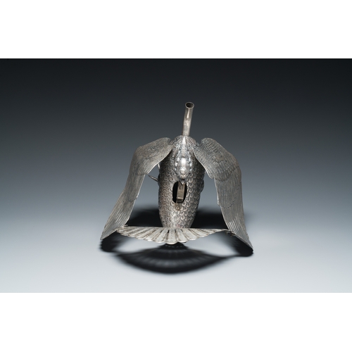 400 - A rare Indonesian silver 'Garuda' oil lamp for the Wayang theatre, 'blencong', 19th C.Description:H.... 