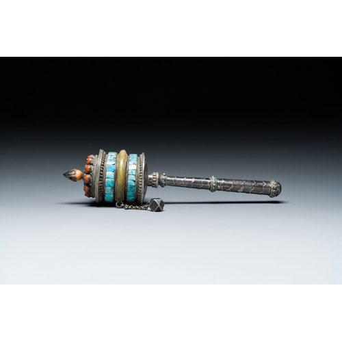 401 - A Tibetan silver prayer wheel with turquoise and coral inlay, 19th C.Description:L.: 25 cmCondition ... 