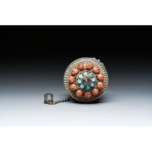 401 - A Tibetan silver prayer wheel with turquoise and coral inlay, 19th C.Description:L.: 25 cmCondition ... 