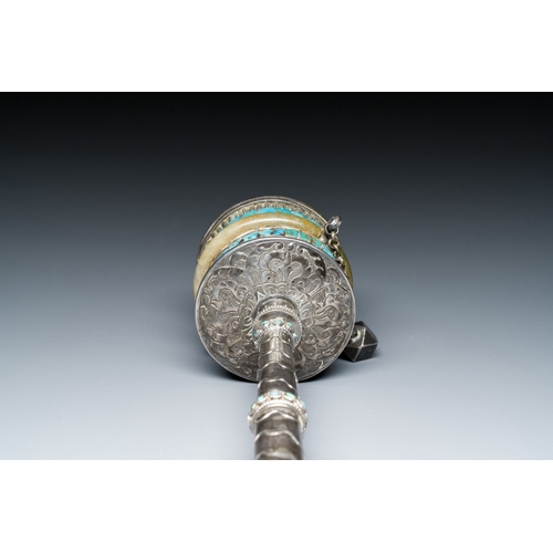 401 - A Tibetan silver prayer wheel with turquoise and coral inlay, 19th C.Description:L.: 25 cmCondition ... 