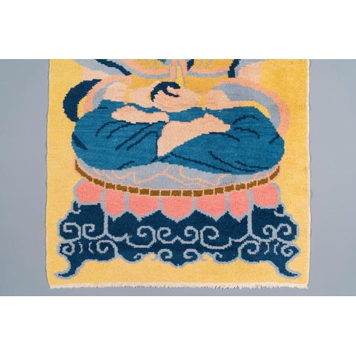 403 - A yellow-ground 'Buddha' rug, China or Tibet, 19/20th C.Description:Dim.: 158 x 85,5 cmCondition rep... 