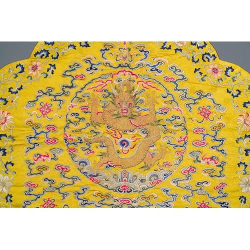 405 - An imperial Chinese embroidered silk gold-thread yellow-ground cushion cover, 19th C.Description:Dim... 