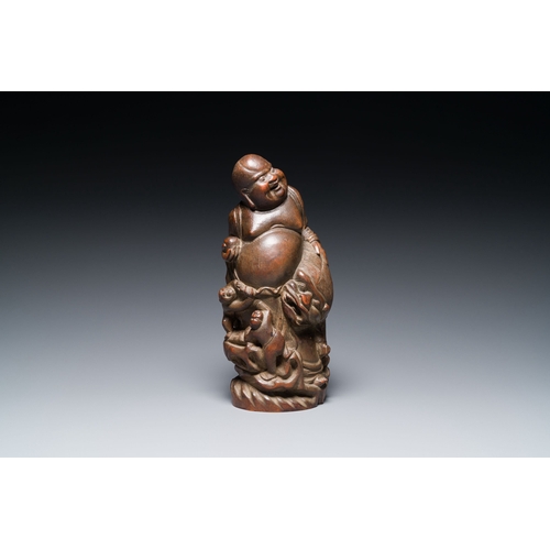 413 - A Chinese bamboo sculpture of Buddha, 18/19th C.Description:H.: 26,5 cmCondition reports:Please cont... 