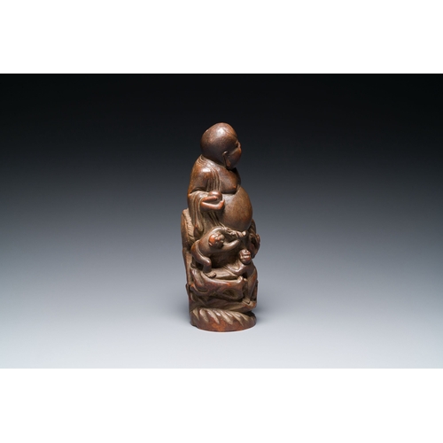 413 - A Chinese bamboo sculpture of Buddha, 18/19th C.Description:H.: 26,5 cmCondition reports:Please cont... 