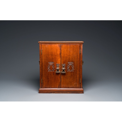 416 - A Chinese huanghuali and hardwood cabinet with bronze fittings for the European market, 19th C.Descr... 