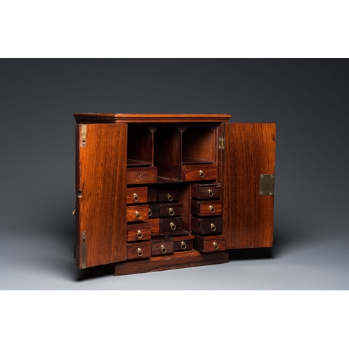 416 - A Chinese huanghuali and hardwood cabinet with bronze fittings for the European market, 19th C.Descr... 