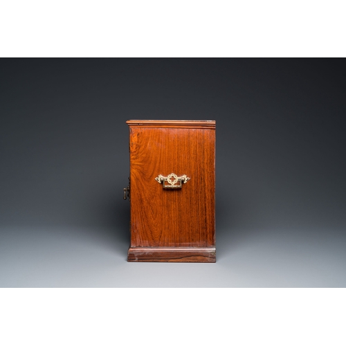 416 - A Chinese huanghuali and hardwood cabinet with bronze fittings for the European market, 19th C.Descr... 