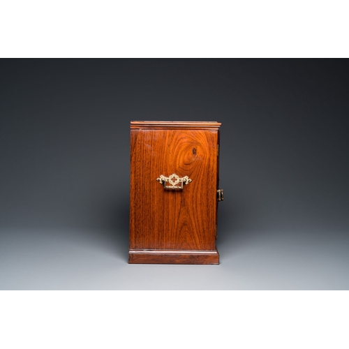 416 - A Chinese huanghuali and hardwood cabinet with bronze fittings for the European market, 19th C.Descr... 