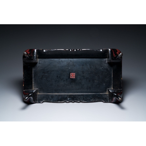 422 - A Chinese rectangular carved red and black lacquer table, 'kang', Xuande mark, 20th C.Description:Di... 