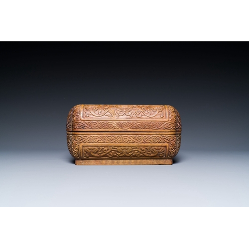 428 - A Chinese rectangular huanghuali wooden box and cover with dragons, 17/18th C.Description:Dim.: 41 x... 