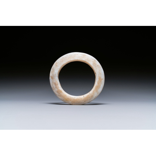 468 - A Chinese white jade bracelet, Liangzhu culture, Neolithic periodDescription:Dia.: 11 cm Provenance:... 