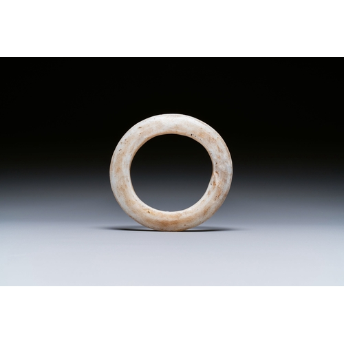 468 - A Chinese white jade bracelet, Liangzhu culture, Neolithic periodDescription:Dia.: 11 cm Provenance:... 