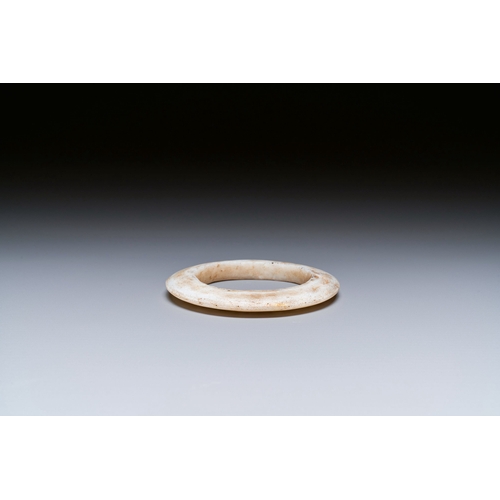 468 - A Chinese white jade bracelet, Liangzhu culture, Neolithic periodDescription:Dia.: 11 cm Provenance:... 