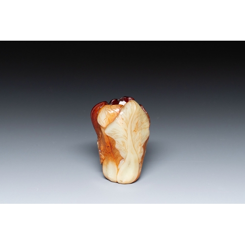 471 - A small Chinese white and russet jade 'cabbage' vase, 19th C.Description:H.: 9,5 cmCondition reports... 