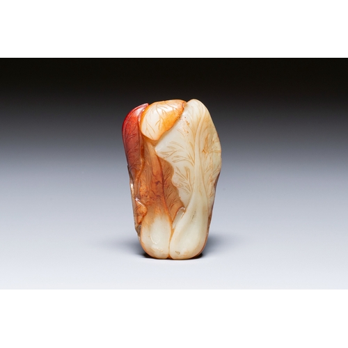 471 - A small Chinese white and russet jade 'cabbage' vase, 19th C.Description:H.: 9,5 cmCondition reports... 