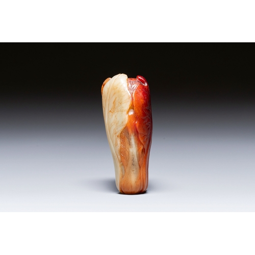 471 - A small Chinese white and russet jade 'cabbage' vase, 19th C.Description:H.: 9,5 cmCondition reports... 