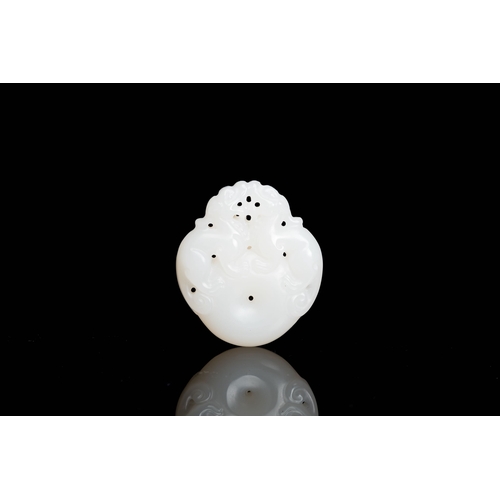 479 - A Chinese white jade 'mythical beasts' pendant, QingDescription:H.: 4,5 cm Provenance:- The collecti... 