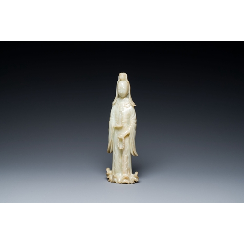 483 - A Chinese celadon jade sculpture of Guanyin, QingDescription:H.: 30,5 cmCondition reports:Please con... 