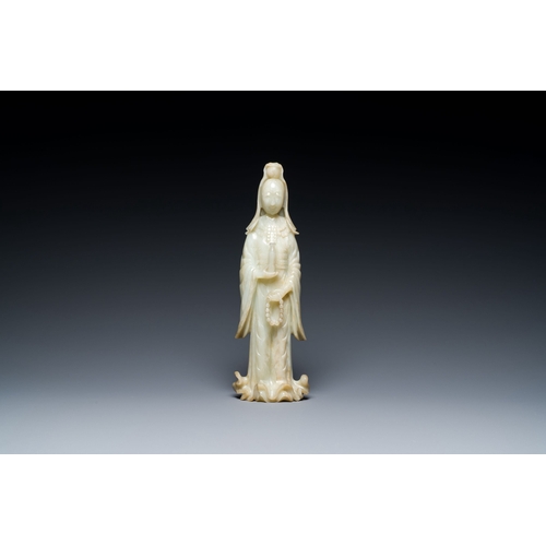 483 - A Chinese celadon jade sculpture of Guanyin, QingDescription:H.: 30,5 cmCondition reports:Please con... 