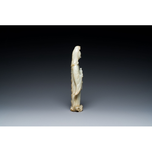 483 - A Chinese celadon jade sculpture of Guanyin, QingDescription:H.: 30,5 cmCondition reports:Please con... 