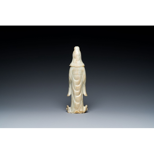 483 - A Chinese celadon jade sculpture of Guanyin, QingDescription:H.: 30,5 cmCondition reports:Please con... 