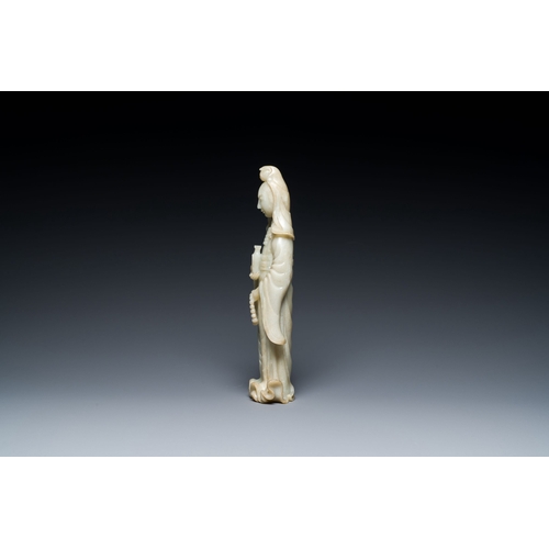 483 - A Chinese celadon jade sculpture of Guanyin, QingDescription:H.: 30,5 cmCondition reports:Please con... 