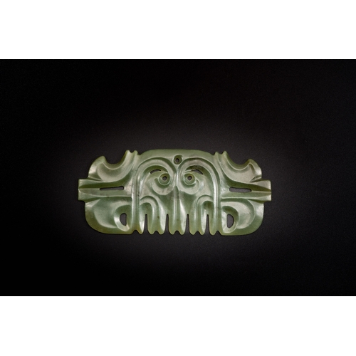 486 - A Chinese spinach jade pendant in Hongshan-style, QingDescription:L.: 13 cm Provenance:An old French... 