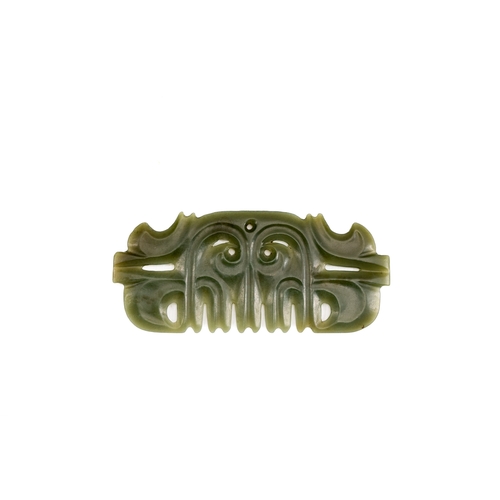 486 - A Chinese spinach jade pendant in Hongshan-style, QingDescription:L.: 13 cm Provenance:An old French... 