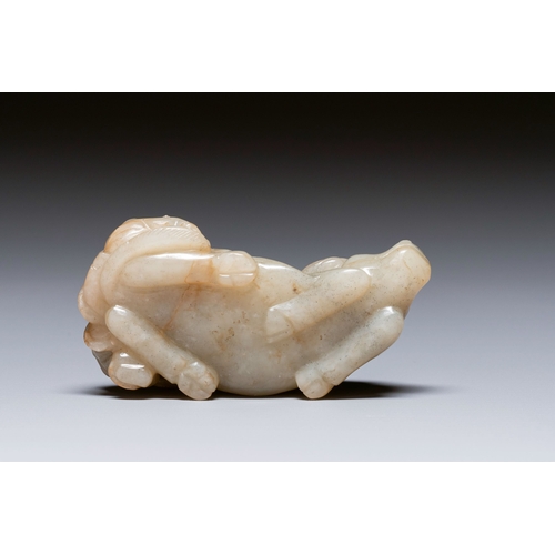 487 - A Chinese jade 'boy on a buffalo' group, QingDescription:L.: 8,5 cmCondition reports:Please contact ... 