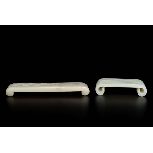 499 - Two fine Chinese white and celadon jade brush rests, QingDescription:Dim.: 13 x 3 x 1,5 cm (the long... 