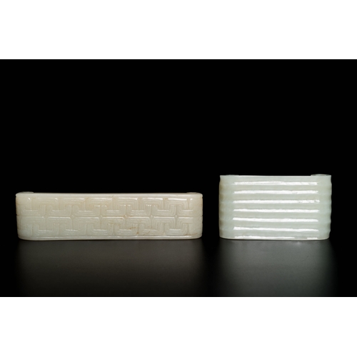 499 - Two fine Chinese white and celadon jade brush rests, QingDescription:Dim.: 13 x 3 x 1,5 cm (the long... 