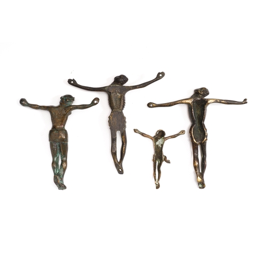 1035 - Four bronze Corpus Christi, 16/17th C.Description:H.: 13,5 cm (the tallest)Condition reports:Please ... 