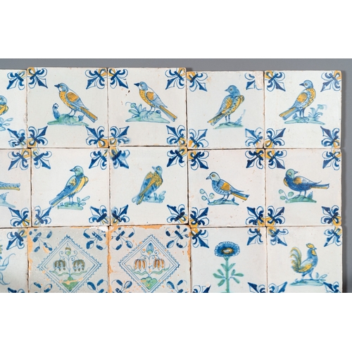 1108 - 30 polychrome Dutch Delft tiles with birds, flowers and tazzas with fruits, 17th C.Description:Dim.:... 