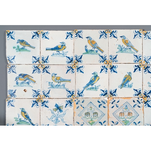 1108 - 30 polychrome Dutch Delft tiles with birds, flowers and tazzas with fruits, 17th C.Description:Dim.:... 