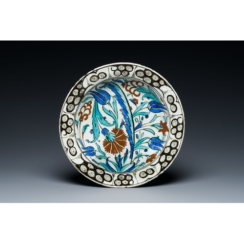 1113 - A polychrome Iznik pottery dish, Turkey, ca. 1600Description:Dia.: 30 cmCondition reports:Please con... 