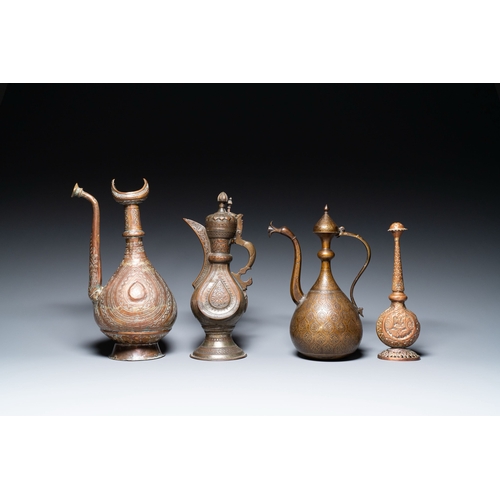 1115 - A varied collection of Islamic copper and tin utensils, 19/20th C.Description:H.: 37,5 cm - L.: 21 c... 