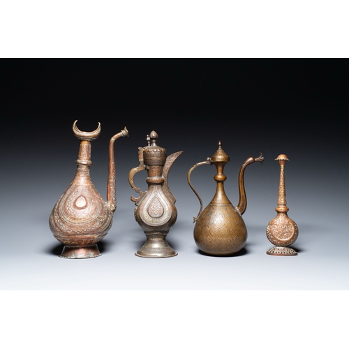 1115 - A varied collection of Islamic copper and tin utensils, 19/20th C.Description:H.: 37,5 cm - L.: 21 c... 