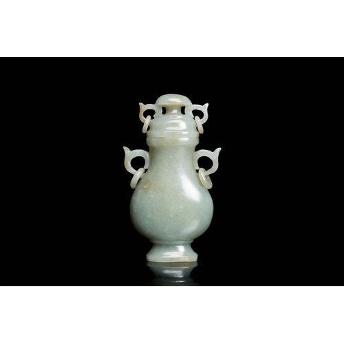 503 - A Chinese celadon jade vase and cover, 19/20th C.Description:H.: 10,5 cm Provenance:- The collection... 