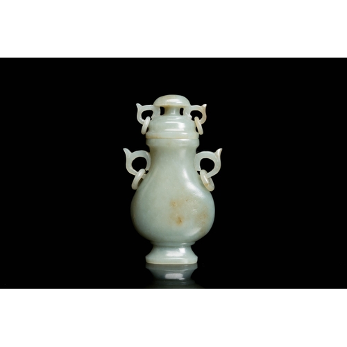 503 - A Chinese celadon jade vase and cover, 19/20th C.Description:H.: 10,5 cm Provenance:- The collection... 