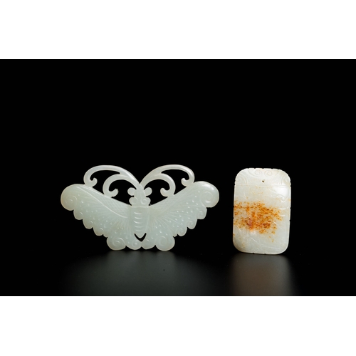 505 - A Chinese white and russet jade pendant and a celadon jade 'butterfly' carving, Qing/RepublicDescrip... 