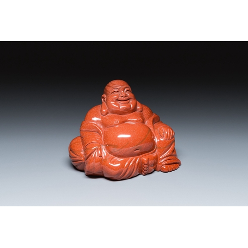 510 - A Chinese emerald green jadeite 'birds' group and a goldstone sculpture of Buddha, 19/20th C.Descrip... 