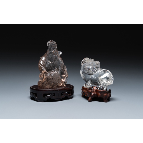 518 - Two Chinese rock crystal sculptures of a sage with a turtle and of a Buddhist lion, 19th C.Descripti... 