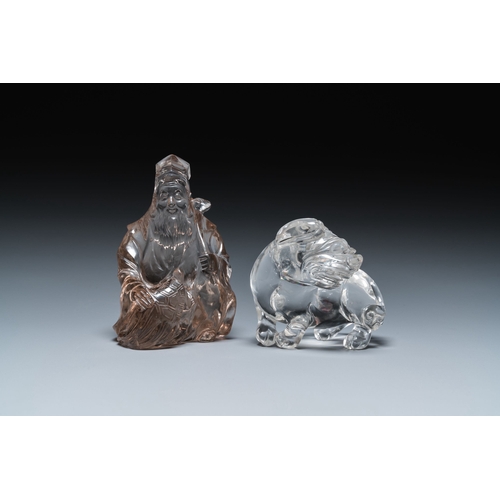 518 - Two Chinese rock crystal sculptures of a sage with a turtle and of a Buddhist lion, 19th C.Descripti... 