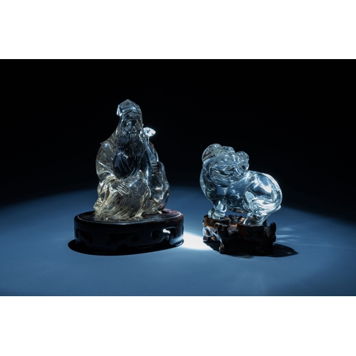 518 - Two Chinese rock crystal sculptures of a sage with a turtle and of a Buddhist lion, 19th C.Descripti... 