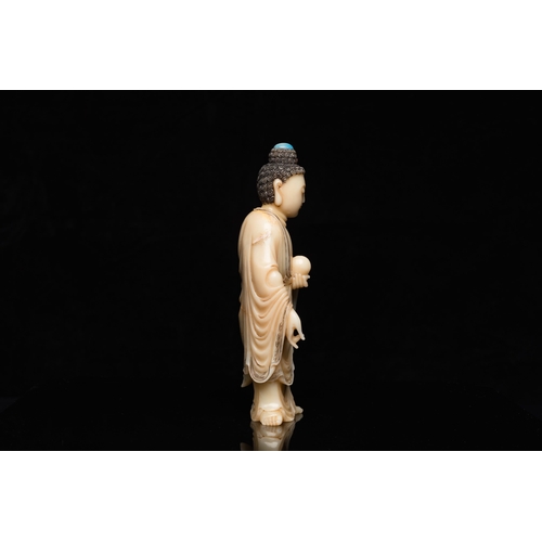 520 - A Chinese carved soapstone figure of the Medicine Buddha or Bhaishajyaguru, QingDescription:H.: 15 c... 