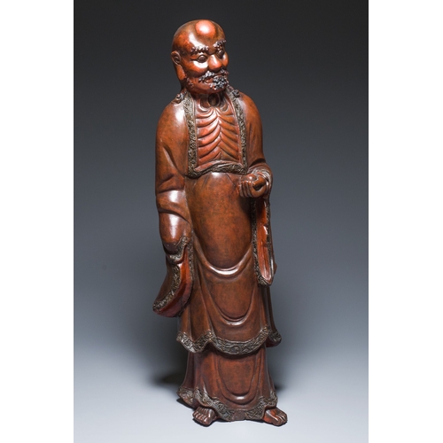 522 - A large Japanese polychromed and lacquered wood figure of Damo, Edo, dated 18/19th C.Description:H.:... 