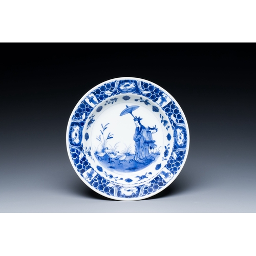 523 - A Japanese blue and white Arita plate with 'Parasol ladies' after Cornelis Pronk, Edo, 18th C.Descri... 